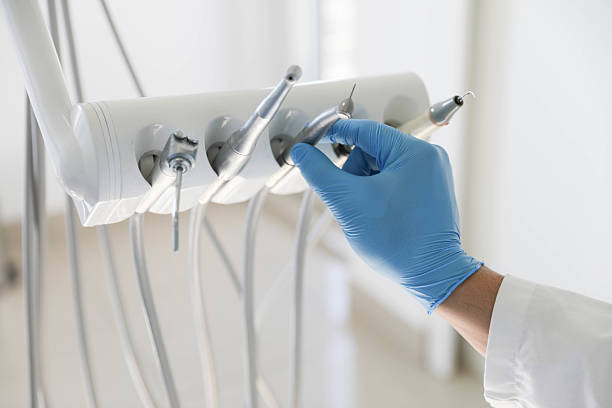 Professional Tooth Extraction technician working in Stokes County County, NC